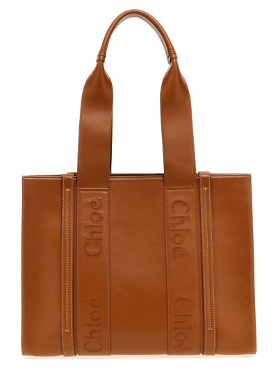 Shop Chloé Medium Woody Shopping Bag In Brown
