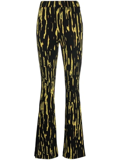 Shop Ambush High Waist Flared Jacquard Trousers In Yellow