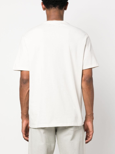 Shop Amiri Logo-print Cotton T-shirt In Neutrals