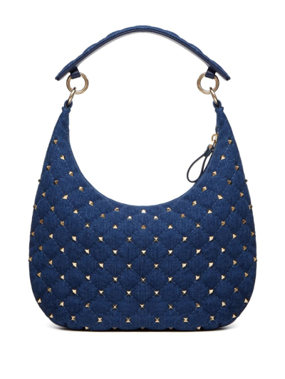 Shop Valentino Small Rockstud Spike Denim Shoulder Bag In Blue