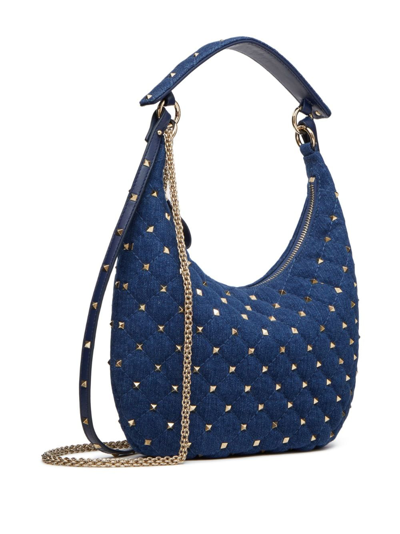 Shop Valentino Small Rockstud Spike Denim Shoulder Bag In Blue