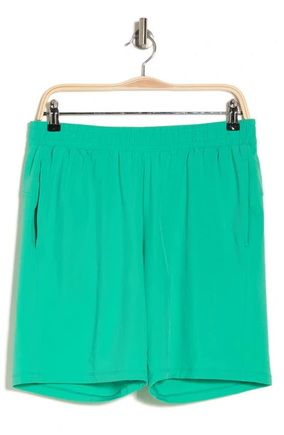 Shop Z By Zella Traverse Woven Shorts In Green Aquamarine