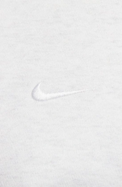 Shop Nike Solo Swoosh Oversize Crewneck Sweatshirt In Birch Heather/ White