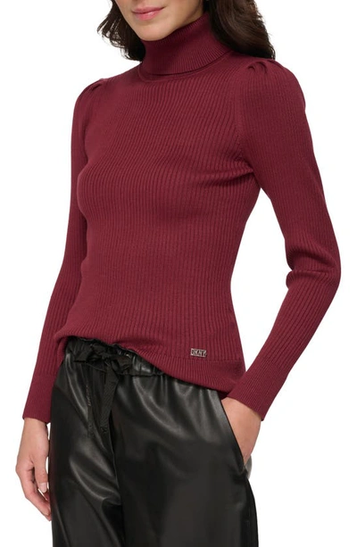 Shop Dkny Puff Sleeve Rib Turtleneck Sweater In Cabernet