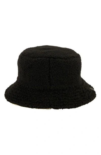 Shop Allsaints Reversible Teddy Fleece Bucket Hat In Black White