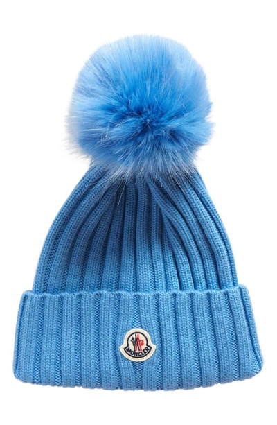Shop Moncler Virgin Wool Rib Beanie With Faux Fur Pompom In Light Blue