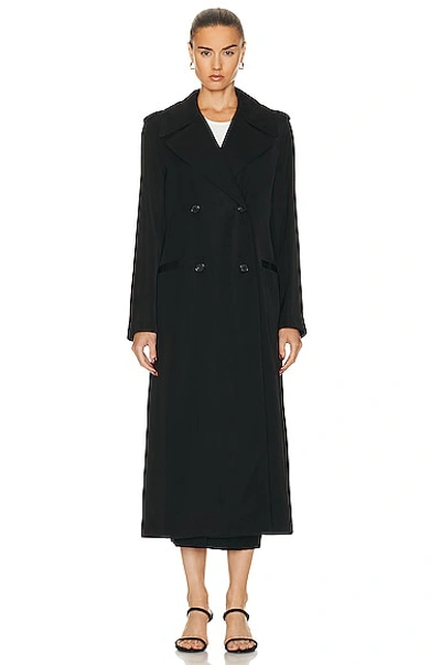 Shop Totême Long Fluid Summer Coat In Black