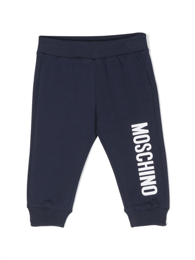 Shop Moschino Logo-print Cotton Track Pants In Blue