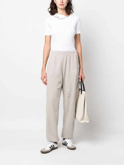 Sporty And Rich Logo-print Cotton Track Trousers In Neutrals