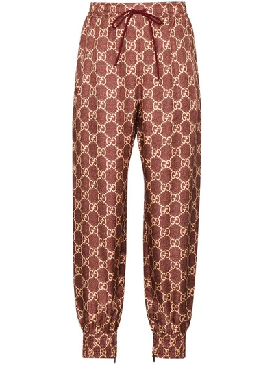 Shop Gucci Gg Supreme Silk Trousers In Red