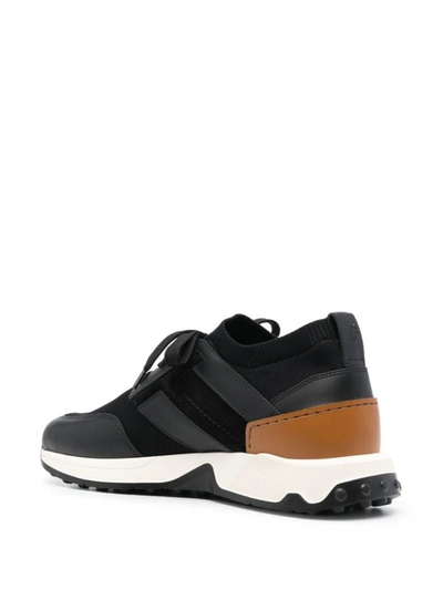 Shop Tod's Low-top Sneakers In Black