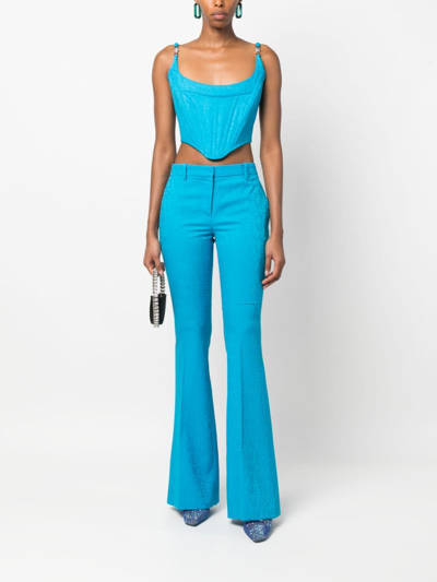 Shop Versace Allover Jacquard Trousers In Blue
