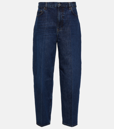 Shop Totême Mid-rise Tapered Jeans In Blue