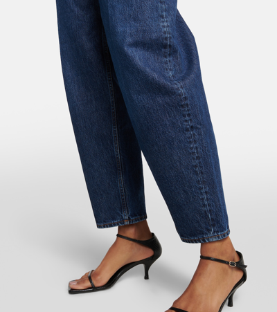 Shop Totême Mid-rise Tapered Jeans In Blue