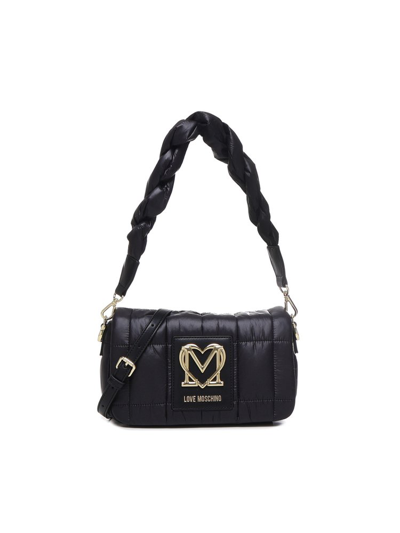 Shop Love Moschino Logo Plaque Quilted Medium Shoulder Bag In Black