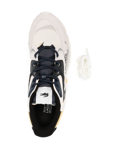 Shop Lacoste Logo-print Panelled Sneakers In White