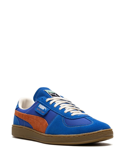 Shop Puma Super Team Handy Sneakers In Blue