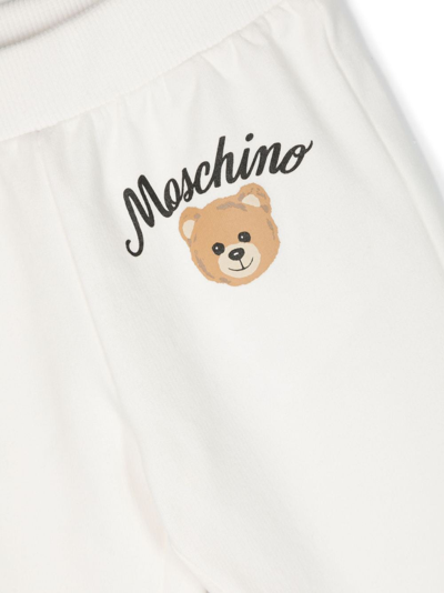 Shop Moschino Logo-print Fleece Track Trousers In White