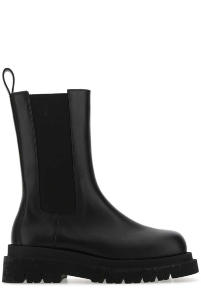 Shop Bottega Veneta Slip-on Lug Ankle Boots In Black