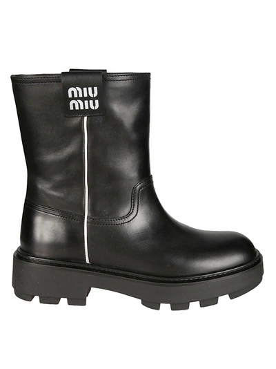Shop Miu Miu Classic Logo Patched Boots In Default Title