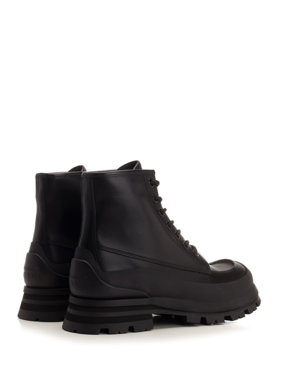 Shop Alexander Mcqueen Wander Lace Up Boot In Black