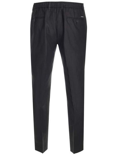 Shop Dolce & Gabbana Tailored Trousers With Monogram In Black