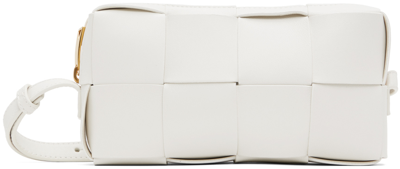 Shop Bottega Veneta White Mini Cassette Crossbody Bag In 9009 White Gold
