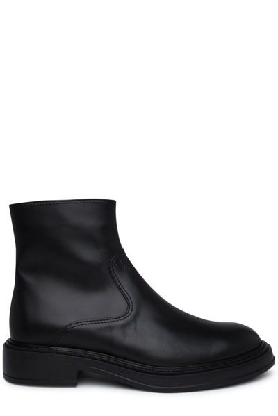 Shop Tod's Almond Toe Ankle Boots In Black