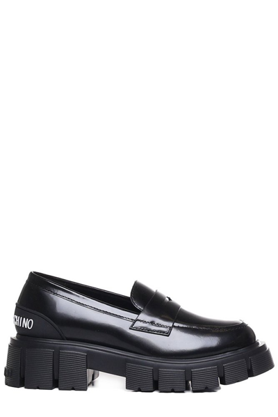 Shop Love Moschino Logo Embossed Chunky Loafers In Black