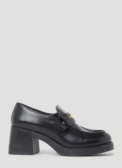 Shop Miu Miu Leather Penny Loafers In Black