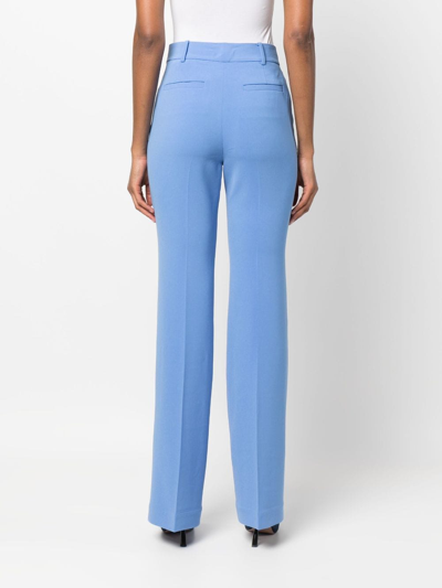 Shop Michael Michael Kors Tailored-cut Straight-leg Trousers In Blue