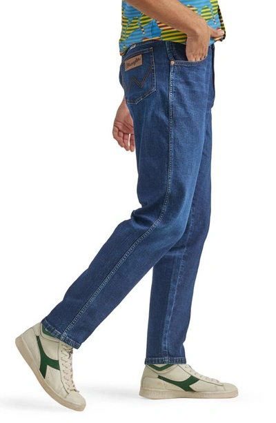 Shop Wrangler Relaxed Tapered Jeans In Kerner
