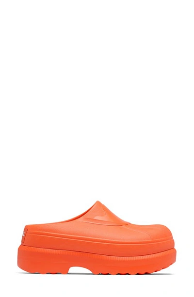 Shop Sorel Caribou Clog In Optimized Orange