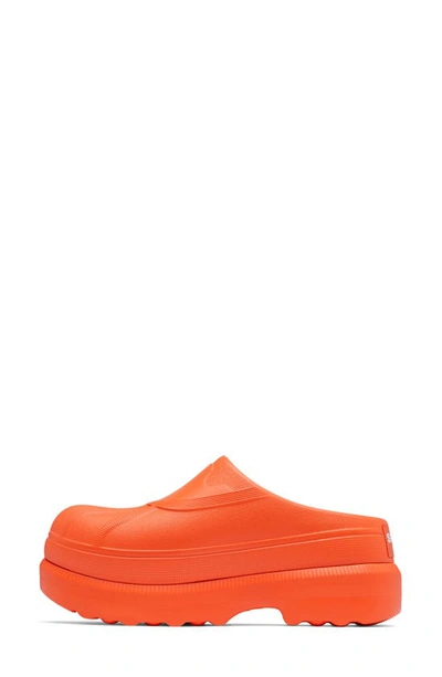 Shop Sorel Caribou Clog In Optimized Orange