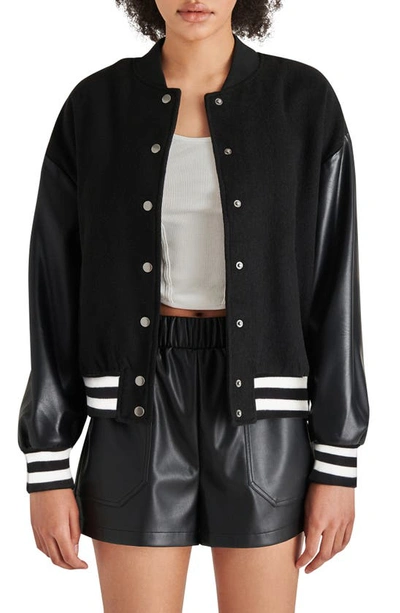 Shop Steve Madden Alexandra Faux Leather Sleeve Varsity Jacket In Black