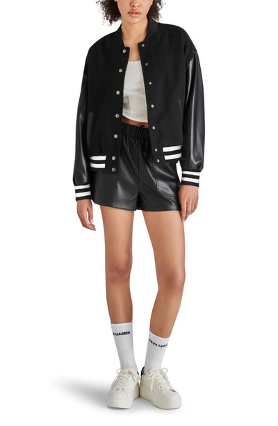 Shop Steve Madden Alexandra Faux Leather Sleeve Varsity Jacket In Black