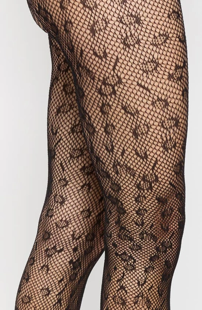 Shop Stems Animal Spot Fishnet Tights In Black