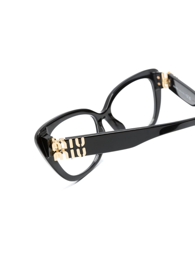 Shop Miu Miu Logo-detail Cat-eye Frame Glasses In Black