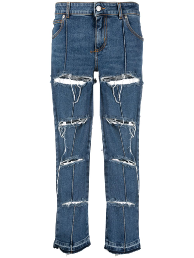 Shop Alexander Mcqueen Distressed Cropped Jeans In Blau