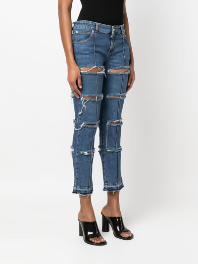 Alexander Mcqueen Distressed Cropped Jeans In Blau