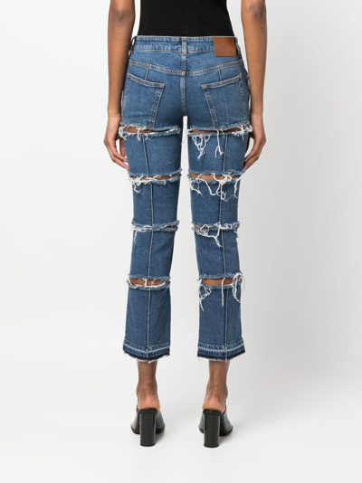 Alexander Mcqueen Distressed Cropped Jeans In Blau