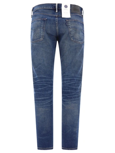 Shop Levi's "502™ Taper" Jeans In Blue