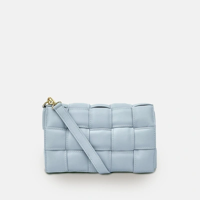 Shop Apatchy London Blue Padded Woven Leather Crossbody Bag