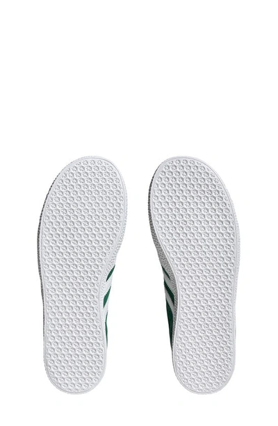 Shop Adidas Originals Kids' Gazelle Sneaker In Dark Green/ Cloud White/ White