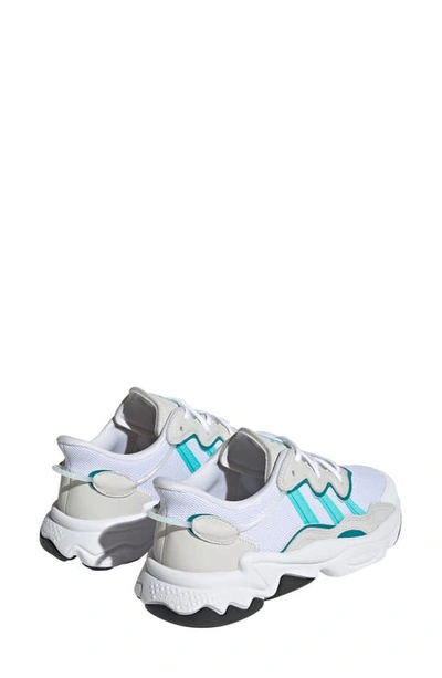 Shop Adidas Originals Ozweego Sneaker In White/aqua/arctic