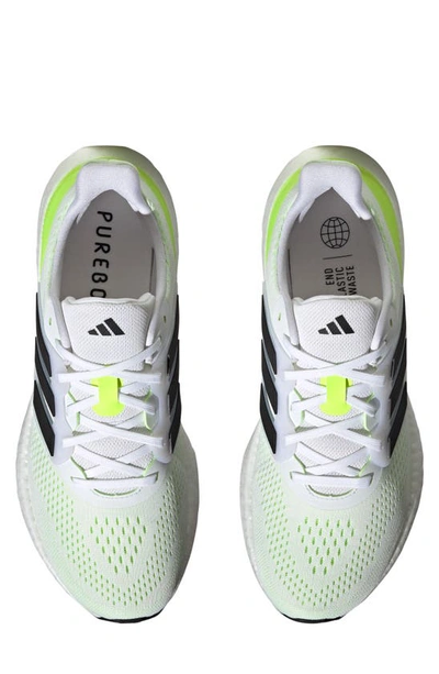 Shop Adidas Originals Pureboost 23 Running Shoe In White/ Black/ Lucid Lemon