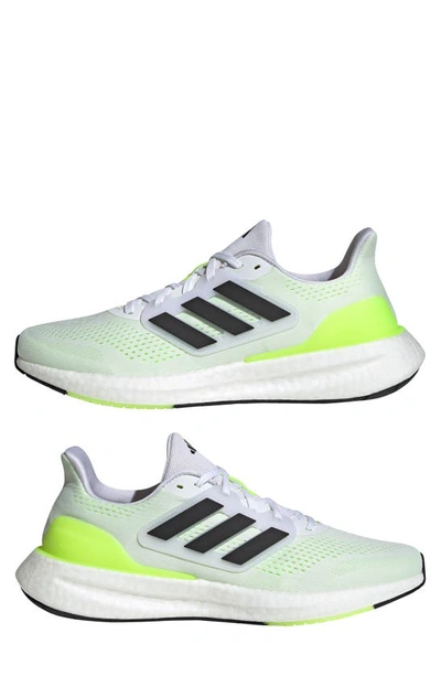 Shop Adidas Originals Pureboost 23 Running Shoe In White/ Black/ Lucid Lemon