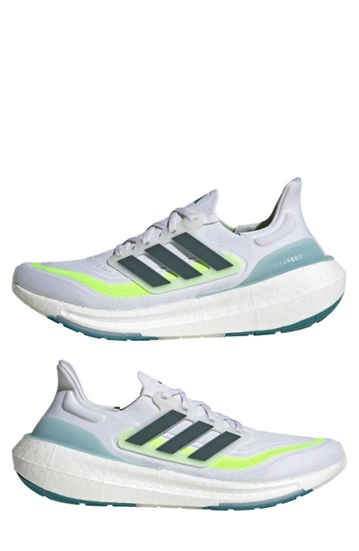Shop Adidas Originals Ultraboost Light Running Shoe In White/ Arctic Night/ Lemon