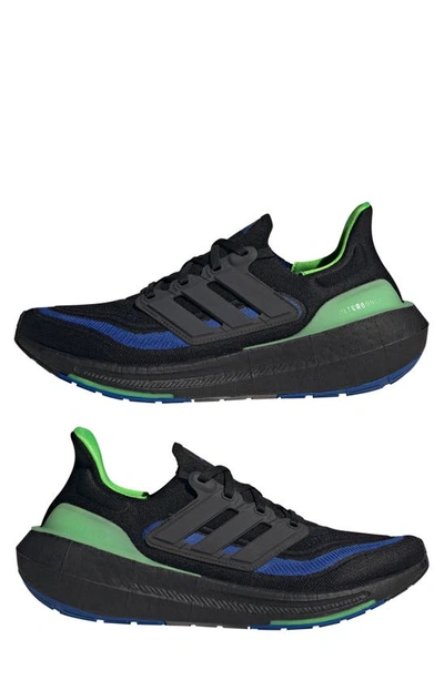 Shop Adidas Originals Ultraboost Light Running Shoe In Black/ Black/ Lucid Lime