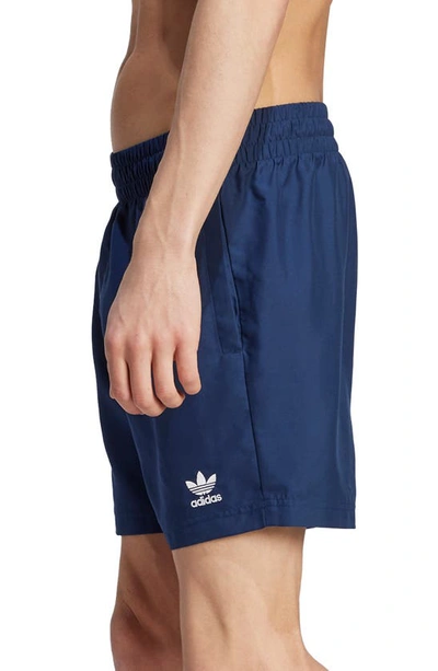Shop Adidas Originals Essentials Solid Swim Trunks In Night Indigo